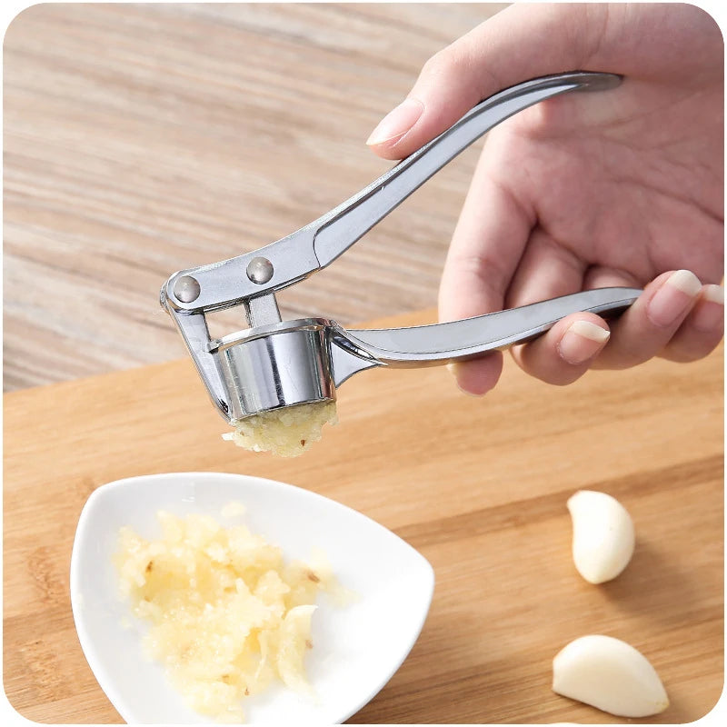 Stainless Steel Garlic Press and Ginger Crusher – Multi-Functional Handheld Kitchen Tool for Mincing and Squeezing - Willow & Wisk